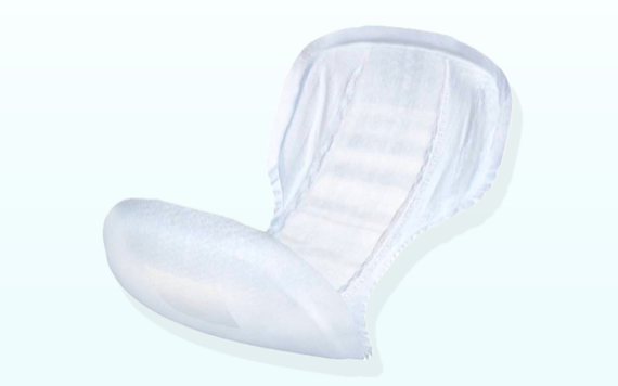 A white incontinence pad with cushioned edges is on a light blue background. It has a textured surface for absorbency.