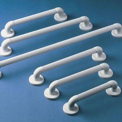 Five white fluted grab rails in different lengths shown diagonally on a blue background, top view.