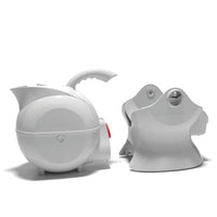 White Uccello Designs kettle with ergonomic handle and rounded base on a plain white background, front view.