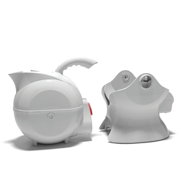 White Uccello Designs kettle with ergonomic handle and rounded base on a plain white background, front view.