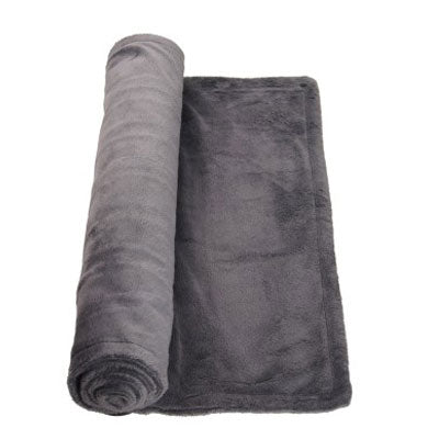 Dark grey fleece heated lap blanket, partially rolled up on a white surface, angled view.