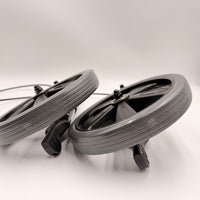 Pair of caster wheels with textured tyres for Urathon Cirrus Lightweight Aluminium Rollator, white background, top view.