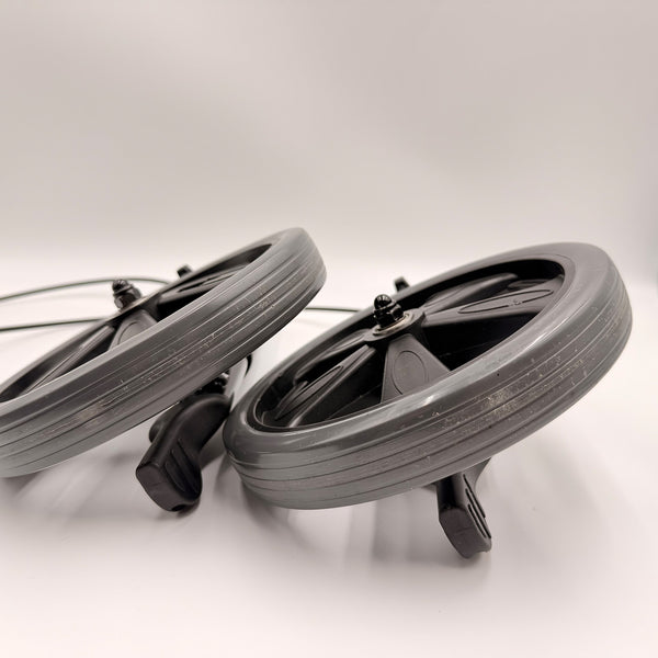 Pair of caster wheels with textured tyres for Urathon Cirrus Lightweight Aluminium Rollator, white background, top view.