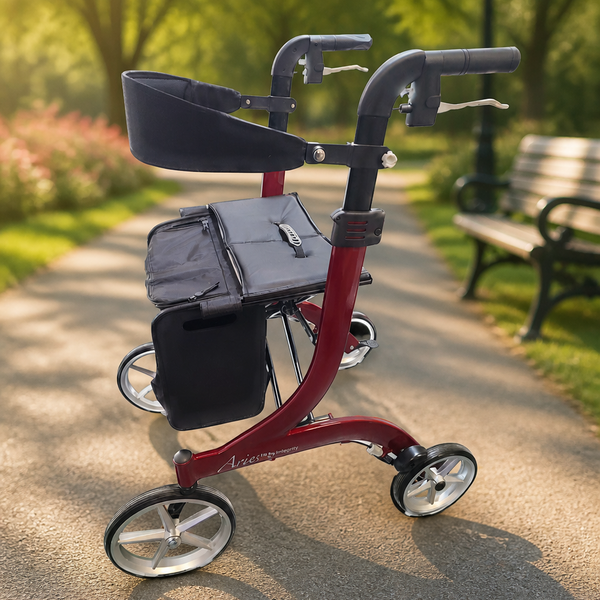Integrity Aries Premium Rollator positioned on a park path next to a bench, side view.