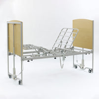 Apollo Super Low Bed with metal frame, wood ends and wheels, electric height adjustment, side view.