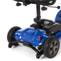 Rear wheels and frame of blue Motion Healthcare eLite Travel Scooter on white background, close-up.