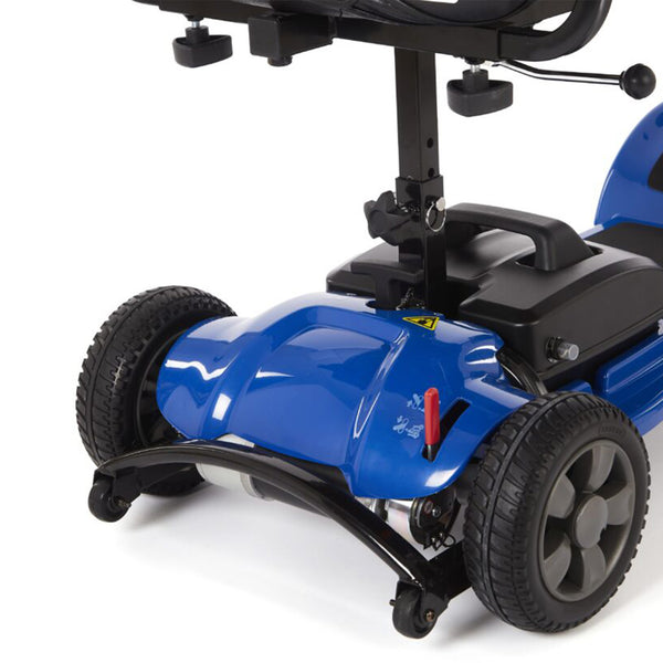 Rear wheels and frame of blue Motion Healthcare eLite Travel Scooter on white background, close-up.