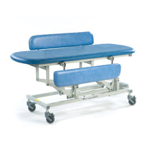 Sterling electric changing table in sky blue with padded top and wheels, front angle.