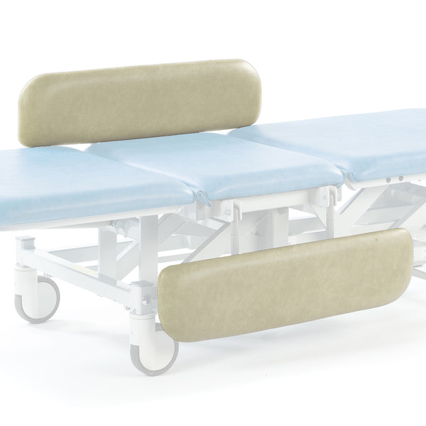 Cream SEERS Medical hydraulic therapy hygiene table with adjustable height, shown from side view.