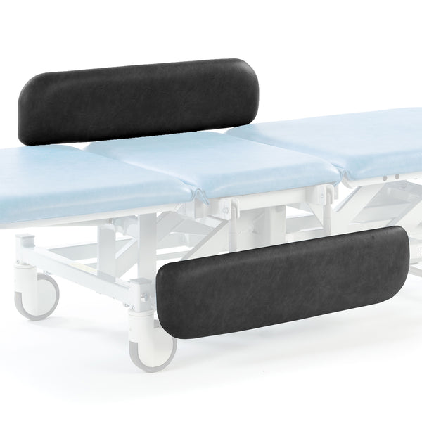 Electric therapy hygiene table with light blue cushion, black supports, wheels, and electric height adjustment, side view.