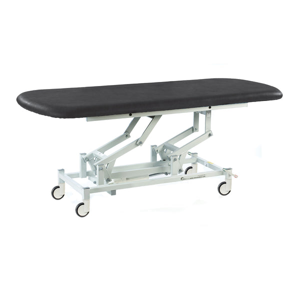 Black electric therapy hygiene table with cushioned top, white frame and wheels, shown from side view.