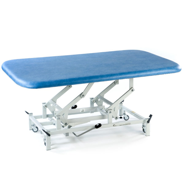 SEERS Medical hydraulic therapy mat table with adjustable height and casters, suitable for rehabilitation, side view.