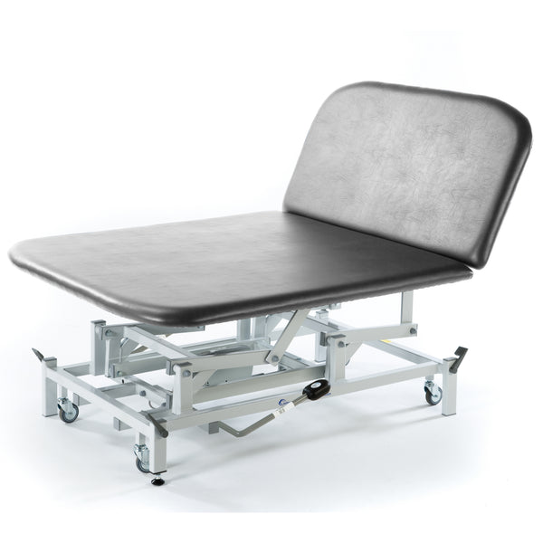 Light grey hydraulic therapy Bobath couch with padded top, metal frame, and wheels for easy movement, side view.