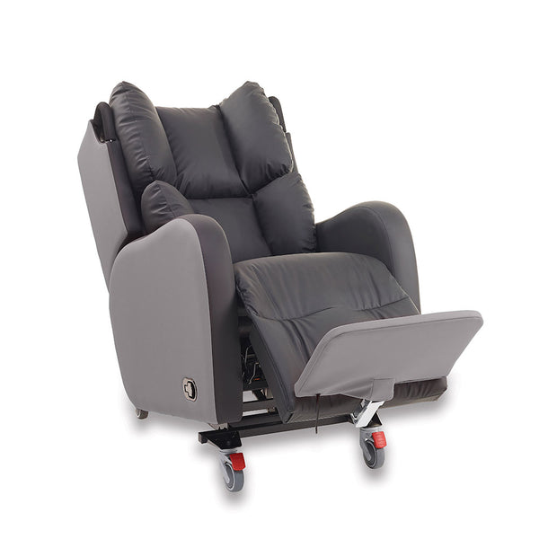 Padded grey porter chair with wheels and an extended footrest, shown from a side angle.
