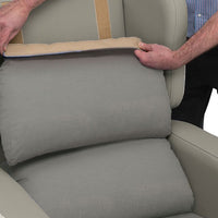 Attaching cushion with Velcro strap to Madison Healthcare Chair by Repose Seating, close-up.