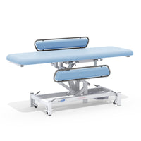 Medi-Plinth electric changing table with MRSA-resistant upholstery, side rails, wheeled metal frame, front view.