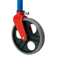Large caster wheel with grey tyre and colourful frame, on Rebotec Pluto Childrens Reverse Walker, close-up view.