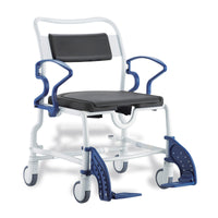 Bariatric mobile shower commode chair with armrests, wide seat, padded backrest and footrests, shown from front angle.