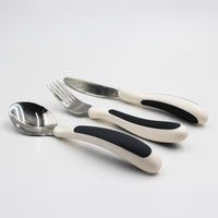 NRS Kura Care Adult Cutlery Set with ergonomic spoon, fork and knife on a white surface, top view.