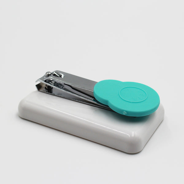 Easi-Grip Table-Top Finger Nail Clipper with non-slip base on a white case, white background, front view.