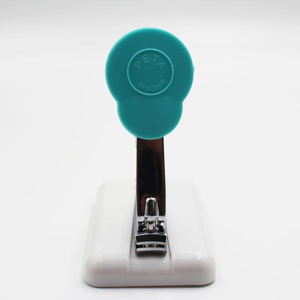 Easi-Grip table-top finger nail clipper with circular top, white base and non-slip feet, front view.