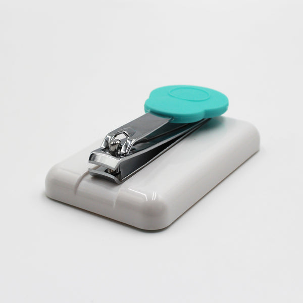 Easi-Grip Table-Top Finger Nail Clipper with handle on white base, shown against white background, front view.