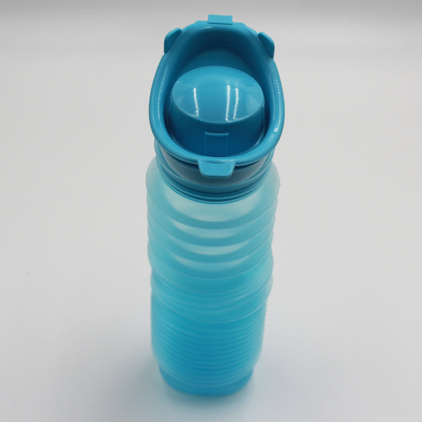 Buckingham Uriwell Unisex Urinal ribbed silicone portable urinal with flip-top lid upright on white background front view.