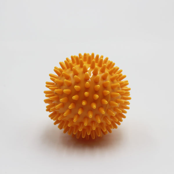 Homecraft Massage Balls with spiky texture for muscle relief, shown on a white background, front view.
