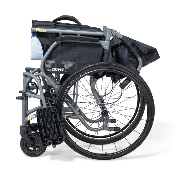 Drive Aero Mg Self Propel ultra-light wheelchair with large rear wheels, folded, side view.