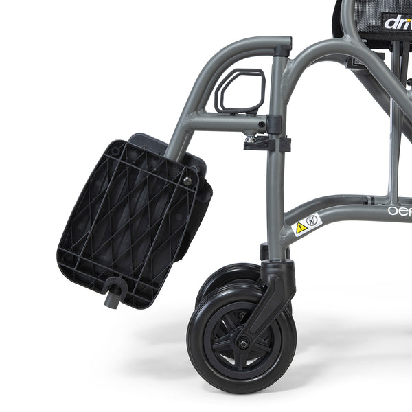 Drive Aero Mg Self Propel Wheelchair front wheel and footrest, white background, close-up.