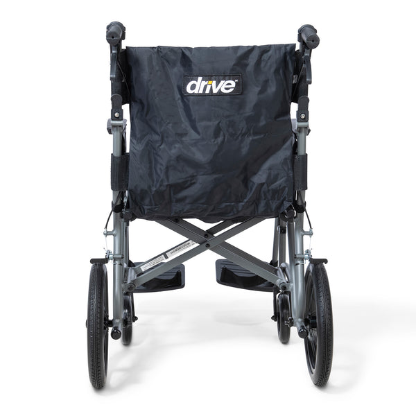 Drive Aero Mg Transit Wheelchair ultra-lightweight travel chair with logo on backrest, rear view.