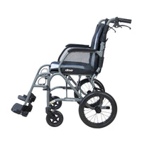 Drive Aero Mg Transit Wheelchair with armrests, footrests and large rear wheels, lightweight design, side view.