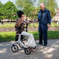 AeroWalk Carbon with a woman sitting down in the park