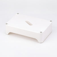 Gordon Ellis Ashby Bath Step with handle slot and four slip-resistant corner pads, front view.