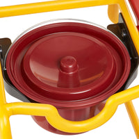 Childrens shower commode chair with yellow frame, red lidded pot and hygiene opening, front angle.