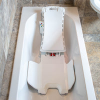 Drive Bellavita NOVA Bathlift with waterproof handset and removable backrest in a bathtub, side view.