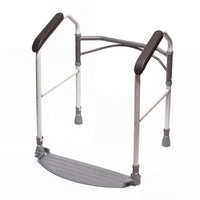 Folding toilet frame with padded armrests and footboard for support around the toilet, shown from the front.