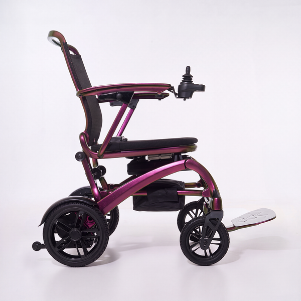 Wizemed C100 carbon fibre folding powerchair with joystick control and raised footrest, side view on white.