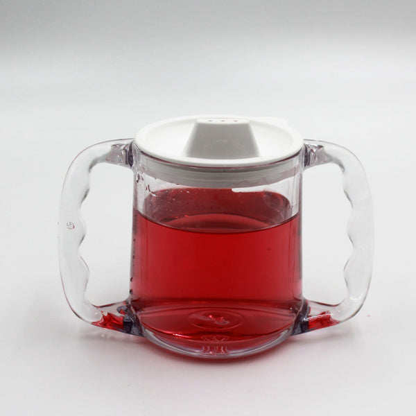 Homecraft Caring Mug with angled handles and spout lid, filled with liquid, on white background, front view.
