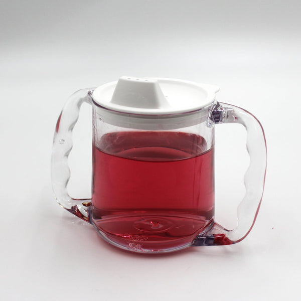 Homecraft Caring Mug with angled handles, white spill-proof lid and red liquid inside, front view.