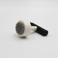 Homecraft Contour Knob Turner with round head and handle, designed for turning knobs easily, close-up view.