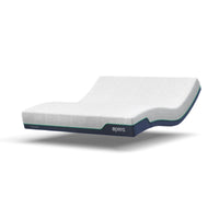 Opera Beds adjustable mattress with textured surface and memory foam, shown bent, Opera branding on side, angled view.
