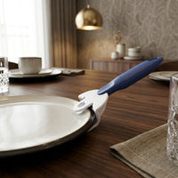 Buckingham Coolhand Plate Gripper for steadying plates on a table, adaptive design, side view.