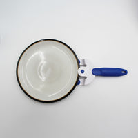 Buckingham Coolhand Plate Gripper with easy grip handle for holding plates, in use close-up.
