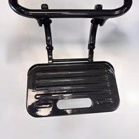 Dash Rehab footrest with textured surface and handle for Dash Carbon Max HD Power Chair, top view on white background.