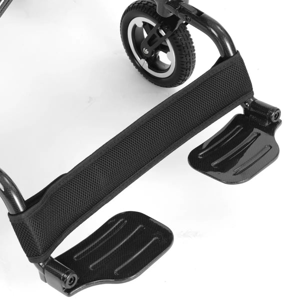 Dash Rehab Dash Carbon Pro Plus Powerchair footrests with fabric calf support strap between them, close-up.