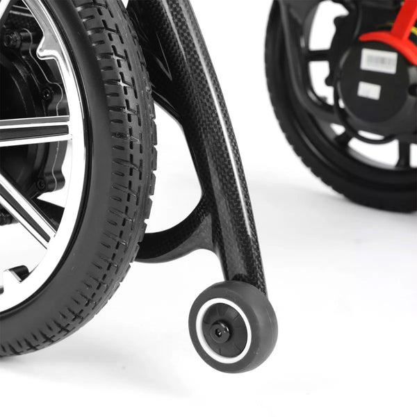 Dash Rehab Dash Carbon Pro Plus Powerchair rear wheel and anti-tip wheel close-up.