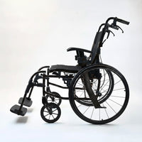 Dash Rehab Dash Lite 4 self propelled wheelchair with aluminium frame and footrests, side view.