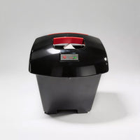 Dash Lunar Powerchair by Dash Rehab, lightweight and portable design on a plain grey background, side view.