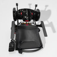 Dash Lunar Powerchair with armrests, joystick control, and large rear wheels, side view.